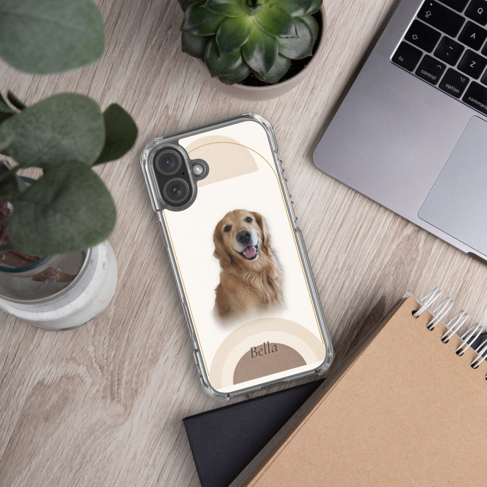 Pet portrait phone case on the Sand arches background with the name Bella, on a desk beside a notebook